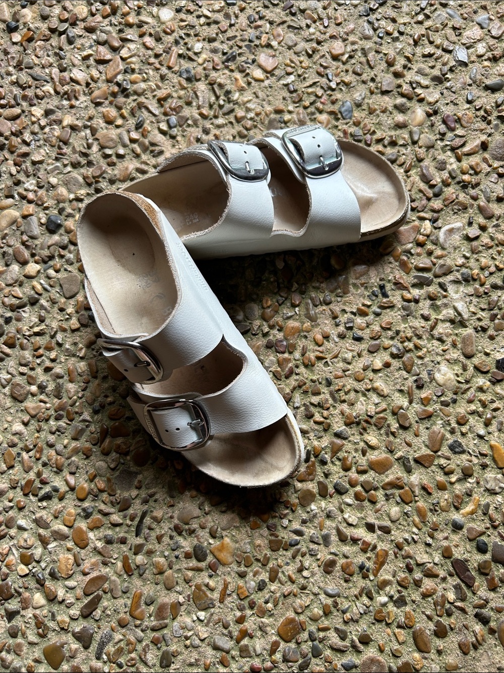 Birkenstock white sandals.